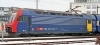 Elektrick lokomotva SBB typ Re 450 026, ra V s logom ZVV pre prmestsk dopravu v meste Zrich