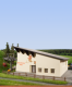 Lanovka Hahnenkammbahn - budovy hornej a dolnej stanice