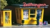 Newspaper stand with telephone booth