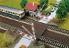 Level-crossing with gatekeepers house